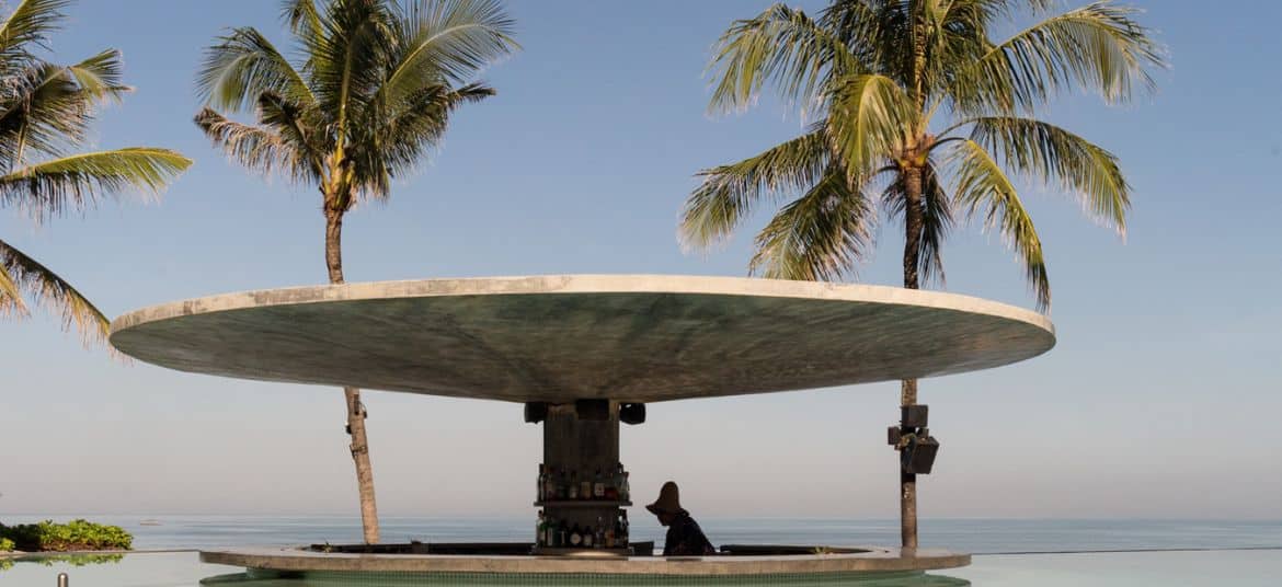 People enjoying a vibrant party at a beach club in Canggu, Bali
