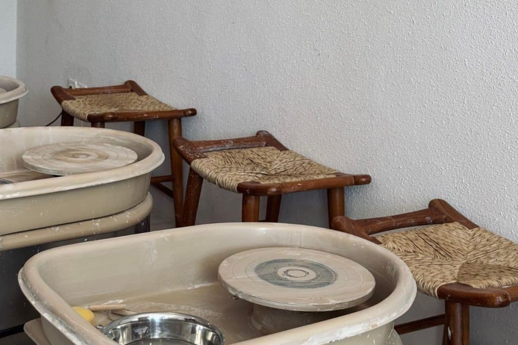 multiple pottery wheels inside the studio