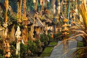 Balinese road decorated with many penjor for Galungan and Kuningan.