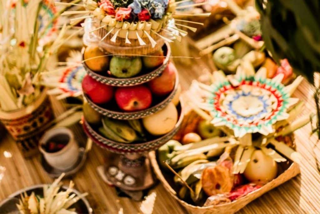 Balinese offerings placed on the ground during Galungan.