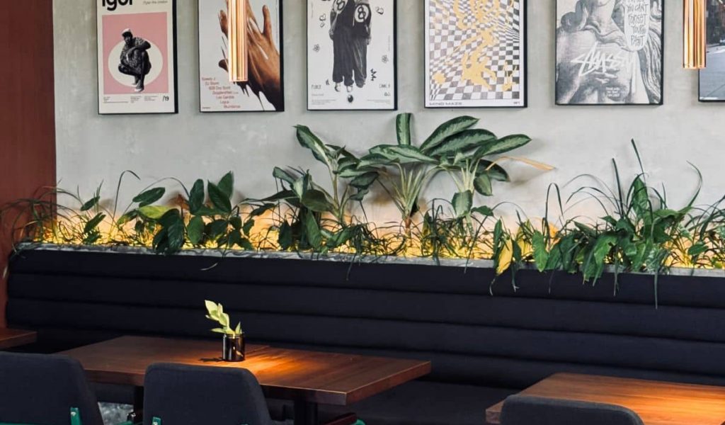 Warm Café Interior Interior view with wooden tables and tiled counter