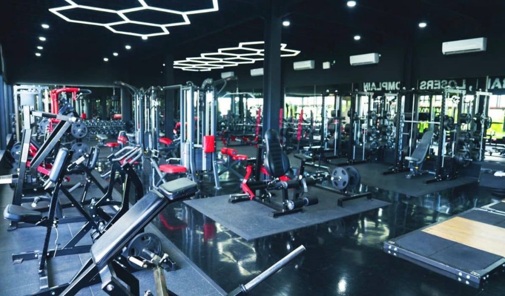Obsidian Gym — State-of-the-Art Fitness Facility Obsidian gym modern workout area with weights and machines
