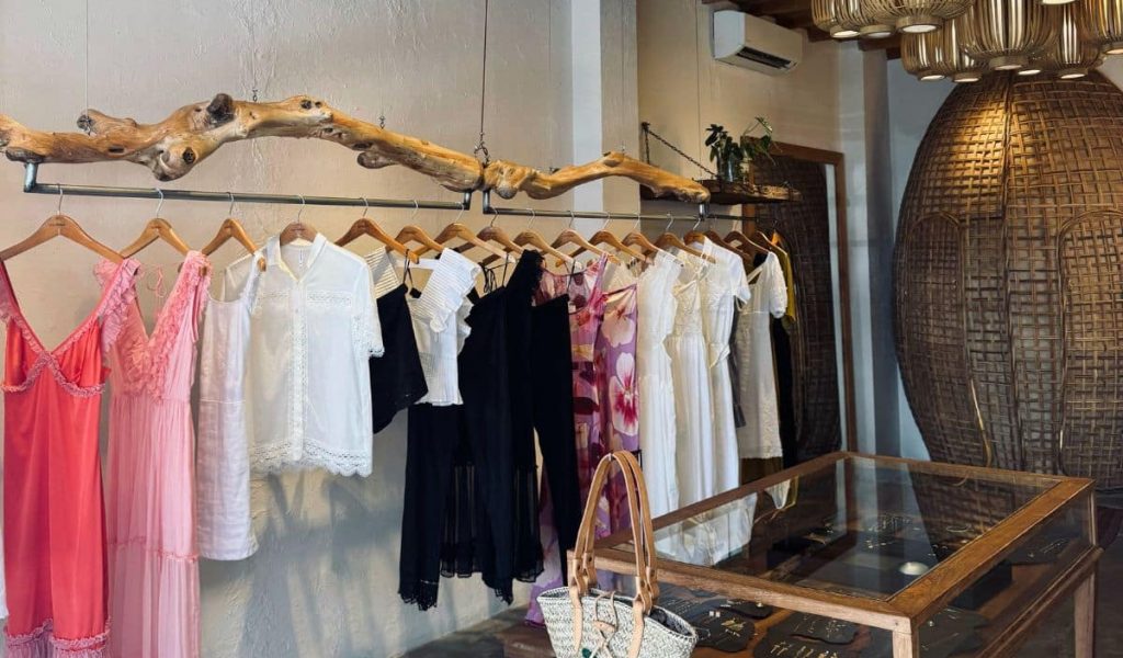 Lulu Yasmine Boutique Interior Lulu Yasmine with flowing dresses and elegant décor.