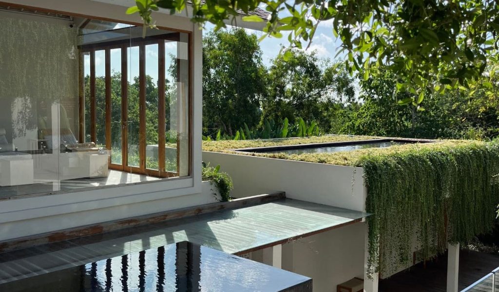 Spring Spa Uluwatu – Outdoor Beauty Outdoor relaxation space at Spring Spa Uluwatu surrounded by greenery