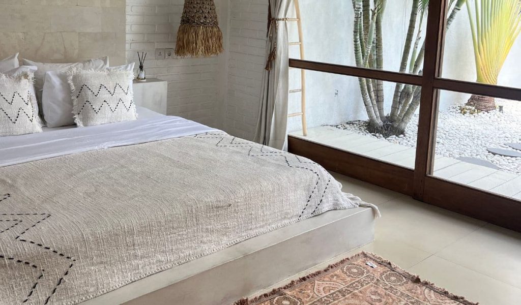 Tropical Elegance at Villa Magnolia Bright, modern bedroom at Villa Magnolia with tropical touches