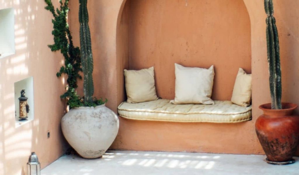 Gaia Villa – Poolside Bohemian Bliss Gaia Villa pool surrounded by greenery and rustic decor